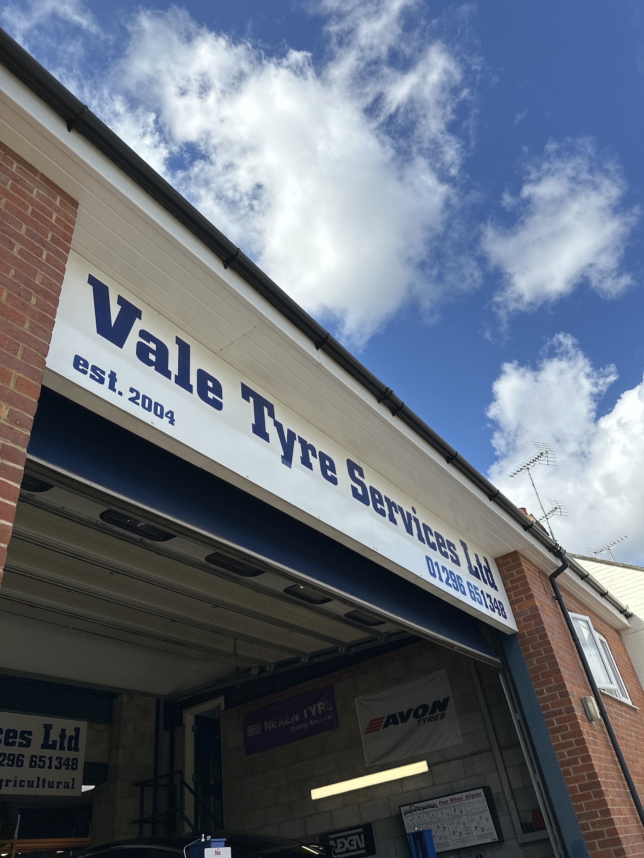 The fascia sign: Vale Tyre Services Ltd, est. 2004, 01296 651348