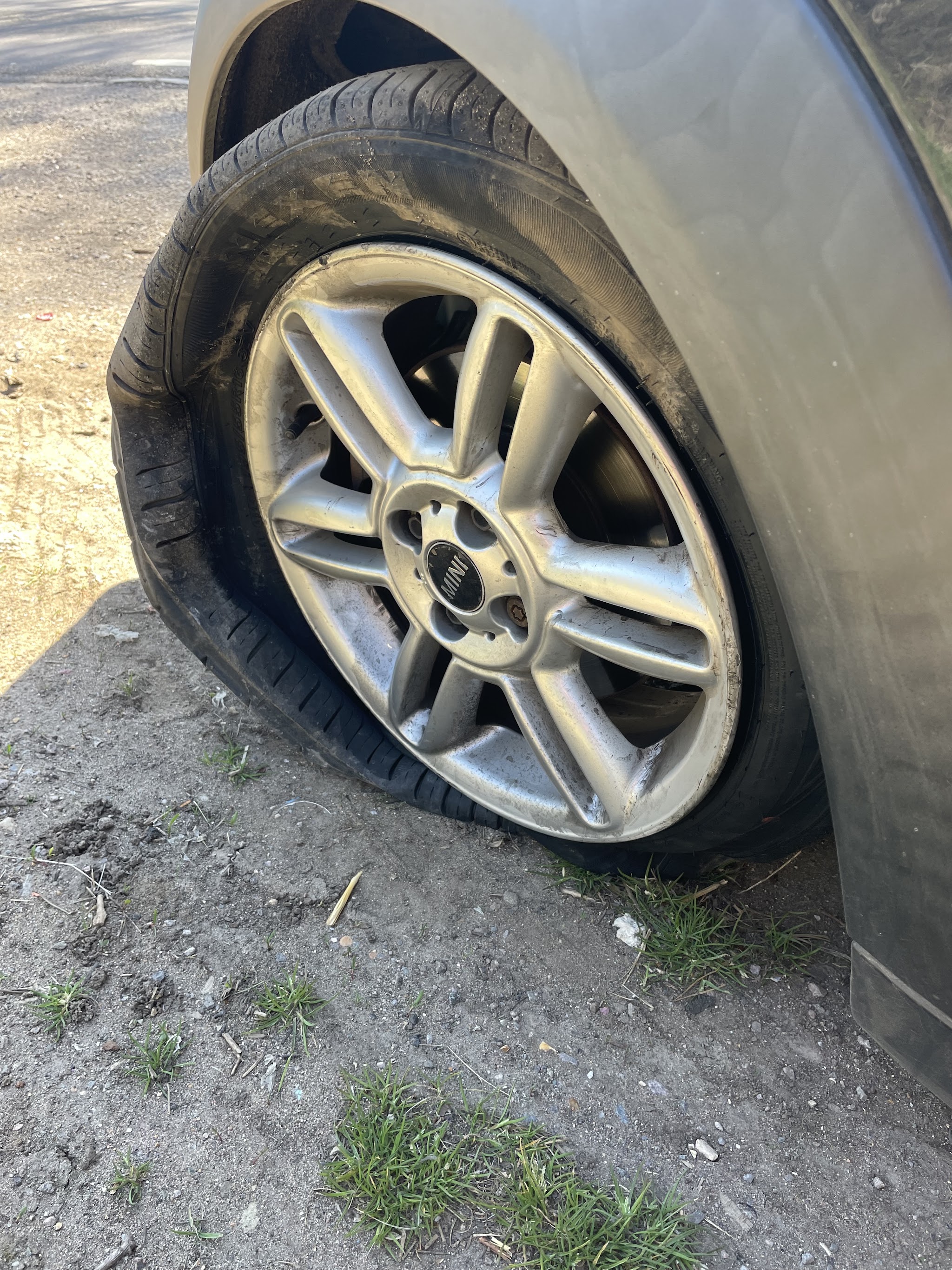 A flat tyre on an alloy wheel, the kind of puncture we repair while you wait